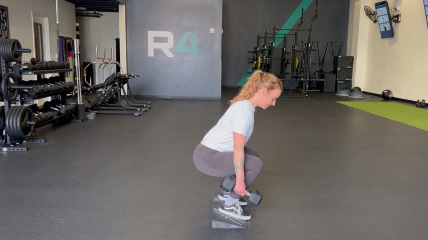 Suitcase Squat — Heels Elevated